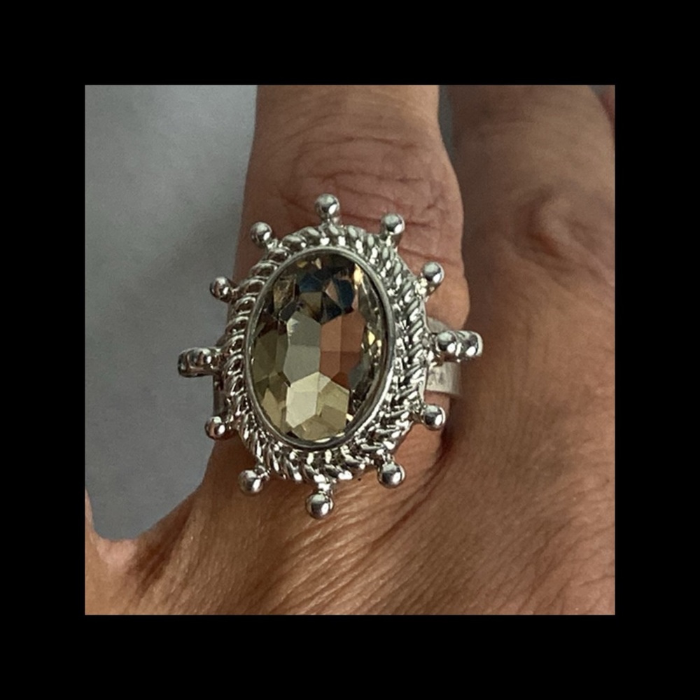 Elegant Silver Statement Ring with Gemstones